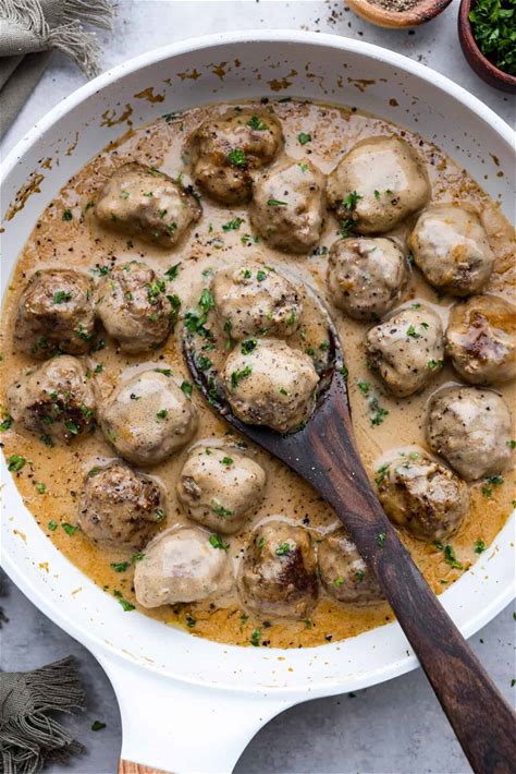 Swedish meat balls with mash potatoes with carrots, peas and corn